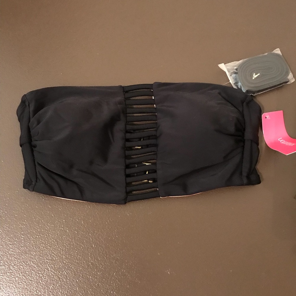 Brand new bathing suit top.